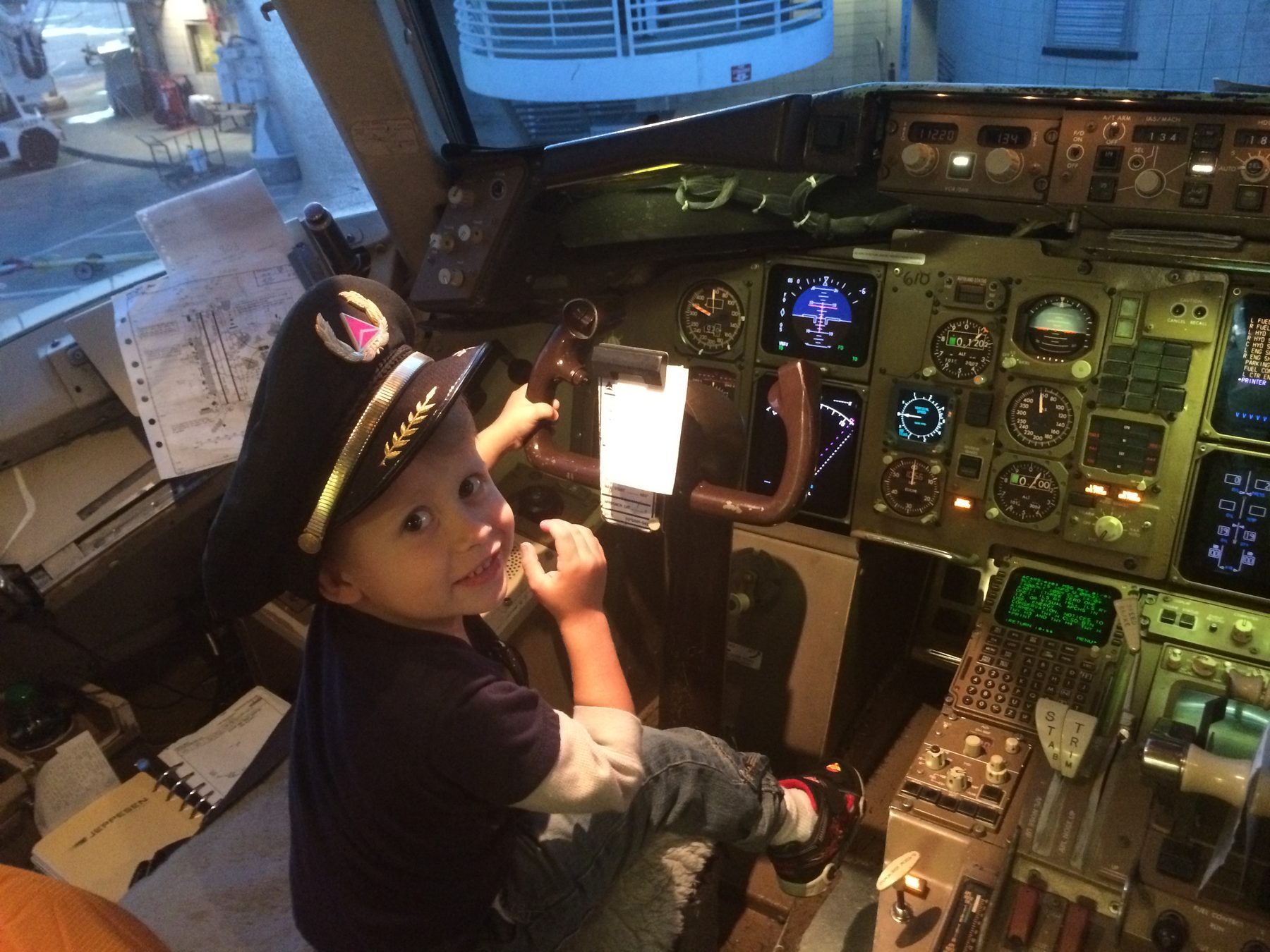 My son in an airliner cockpit