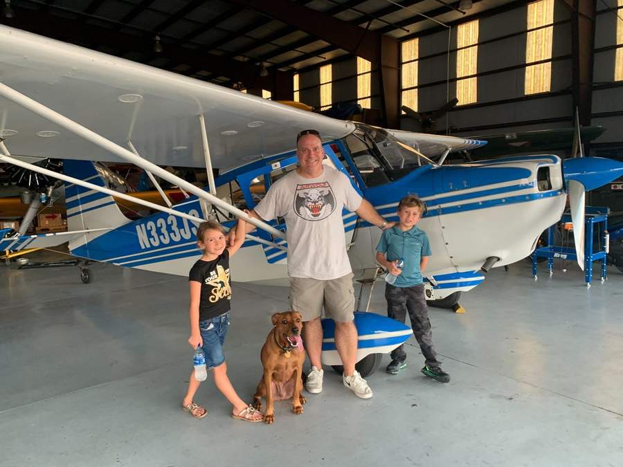 Cliff Clover with family at the hangar